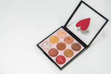 Love and Valentine concept - isolated cute eyeshadow palette for women beauty
