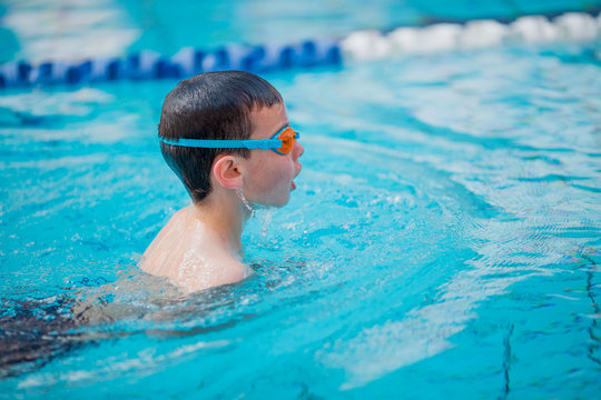 Boy swimming Freestyle