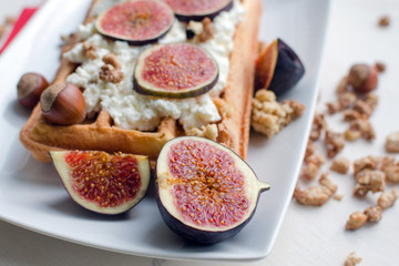 Fototapeta na wymiar vienna wafer with ricotta and fresh figs