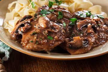 Delicious chicken marsala served with fettucine pasta