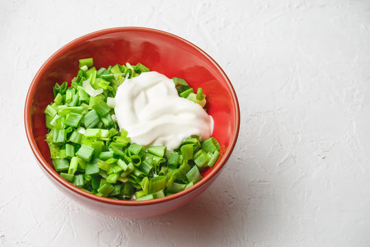 Sliced green onions or scallions in a bowl