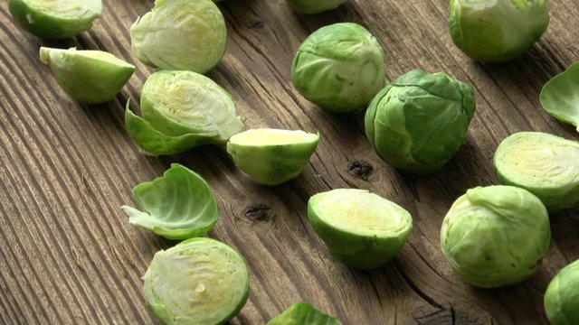 Brussels sprouts (Brassica oleracea) on old wooden table