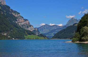 Lake Klontalersee on a summer day. Travel destination in Switzerland.