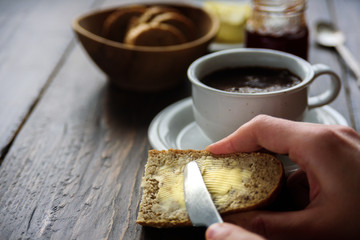 Breakfast with coffee, bread and butter