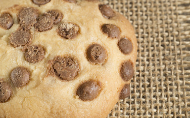 Cookie with chocolate chips on the table