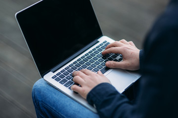 The young manager working on a laptop on coffe break. Lunch Break.