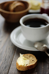 Breakfast with coffee, bread and butter