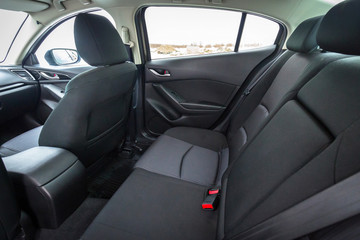 Black car interior with back seats