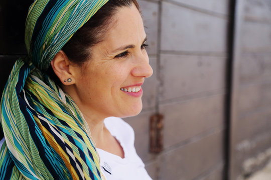 Portrait of beautiful 40 years old woman outdoors