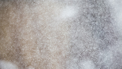 Fototapeta na wymiar snow in the air as a background