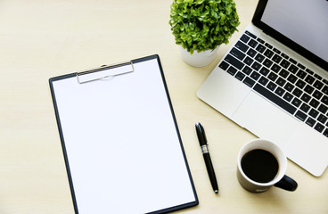 blank paper on the desk businessman with Laptop Coffee Pen Copy space,Top view