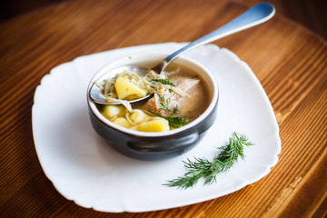 hot soup with homemade noodles in a bowl