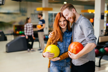 Fototapeta premium Beautiful couple dating and bowling