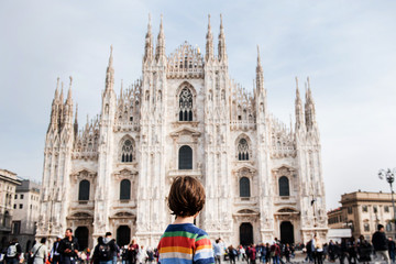  Boy looking at Milan Cathedral, Milan, Lombardy, Italy