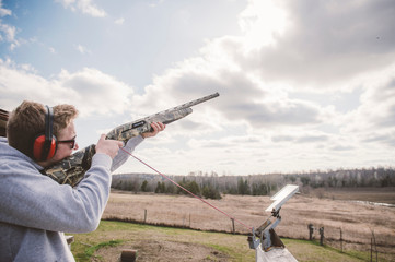 Man skeet shooting