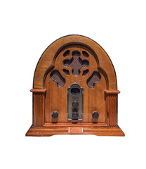 Vintage wood radio from 1930 isolated with a white background.Antique model cathedral.
