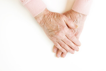 Senior female gesture language, hands signs isolated on solid white background. Old female in her...