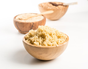 Wooden Bowl full of quinoa.