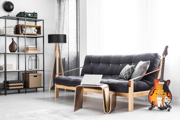 Wooden sofa with black futon