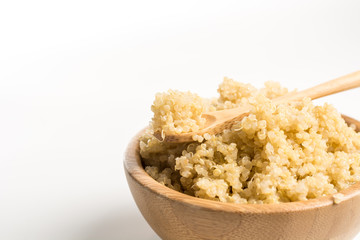 Wooden Bowl full of quinoa.
