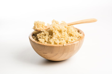 Wooden Bowl full of quinoa.