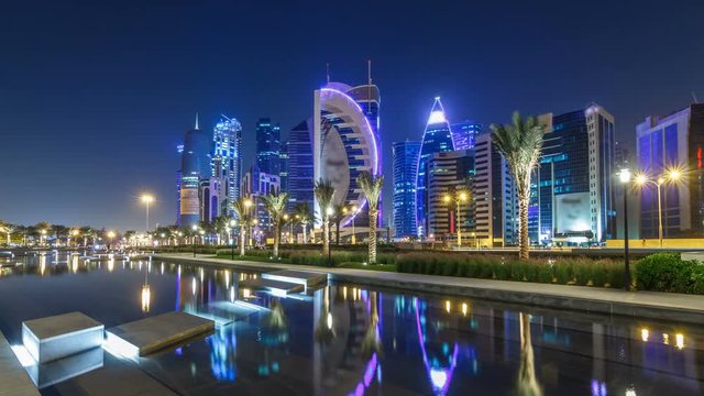 The skyline of Doha by night with starry sky seen from Park timelapse hyperlapse, Qatar