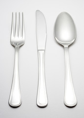 Spoon, knife, fork isolated on white background