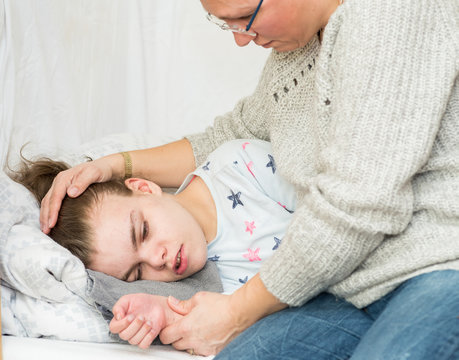 A child with epilepsy during a seizure