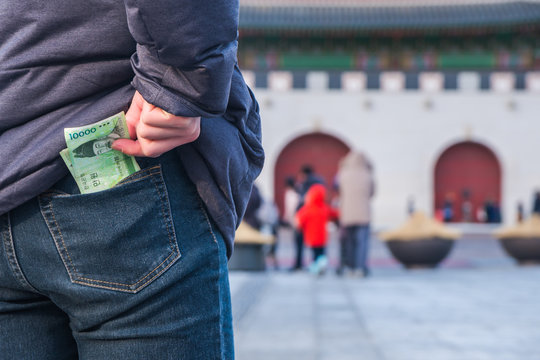 Man Pulls The Korean Money From His Jeans Pocket