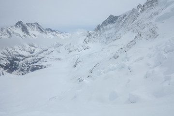 Fototapeta na wymiar View on the peak of the biggest glacier of jungfrau. Bernese Oberland, Switzerland. Swiss Alps