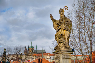 Fototapeta na wymiar Statue seen on Charles Bridge in Prague. Czech republic.