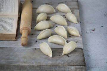 homemade dumplings on a wooden board