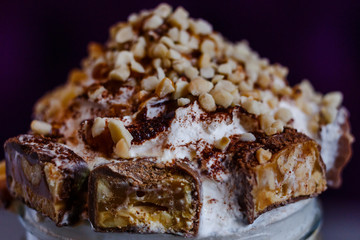 creamy ice cream with chunks of chocolate and nuts
