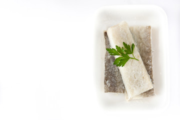 Salted dried cod isolated on white background. Top view.Typical Easter food