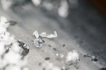Macro photography of snowflake taken in paris during snowfall in Paris. A snowflake is a single ice crystal. looks like ice but very small and very light. it has many shape and used as snow symbols