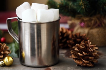 Delicious hot cocoa with marshmallow on Christmas background 