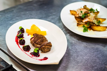Tasty steak on plate at cooking workshop
