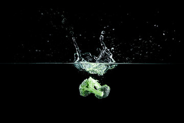 broccoli in water with splash