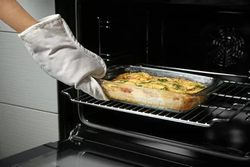 Printed roller blinds meal dishes Woman taking glass baking dish with delicious casserole from oven, closeup