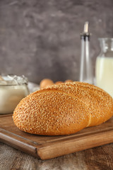 Loaf of bread on table. Fresh from oven