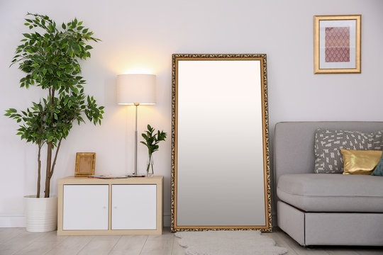 Elegant room interior with large mirror