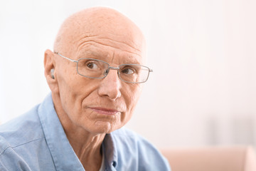 Hearing impaired man at home