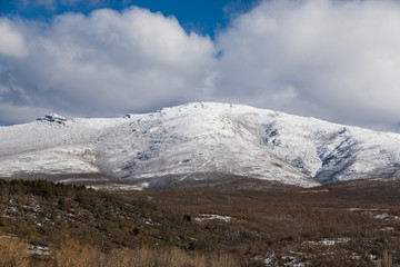 Panoramic of Riaza with the remains of snow still on the mountains