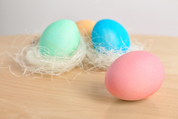 Colorful Easter eggs on table