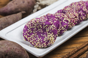 chinese cake on wood table, A mixture of grains and sweet potatoes.