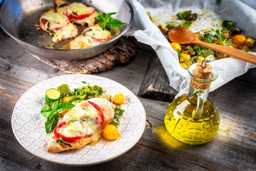 Chicken breast stuffed with mozzarella; basil and tomatoes