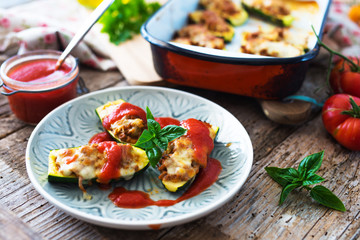 Zucchini stuffed with minced and mozzarella
