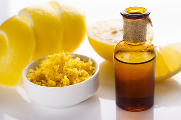 Lemon essential oil on a white background