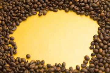 I love coffee concept. Coffee beans on yellow background. Copyspace and closeup