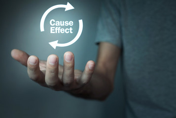Man holding Cause Effect Arrows. Information concept.